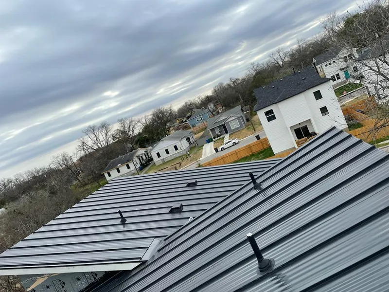 Standing seam metal roof panels with vents for Skylight Repair in University